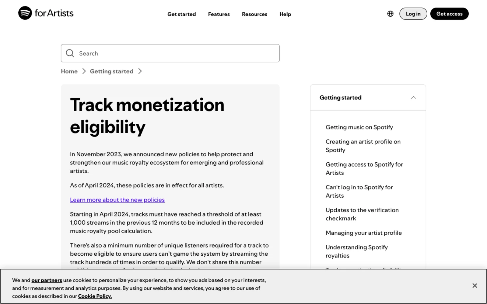 Spotify for Artists support page titled Track monetization eligibility, stating that from April 2024 tracks must reach at least 1,000 streams in the previous 12 months to enter the recorded music royalty pool, plus an unpublished minimum number of unique listeners